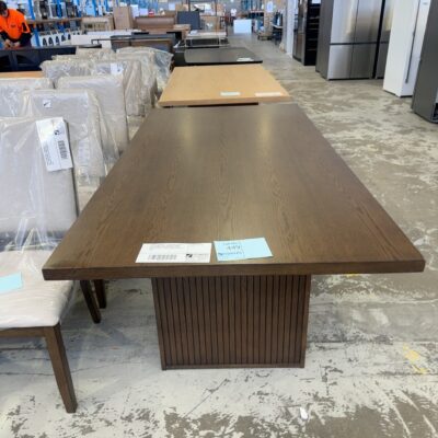 SAMPLE FURNITURE - DEVON MID CENTURY STYLE DINING TABLE, SMOKE OAK VENEER 2000MM LONG, VERTICAL GROOVE PANEL LEGS, SOLD AS IS **SOME DAMAGE AT END OF TABLE**
