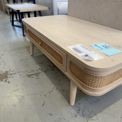 EX DISPLAY JURIEN 1200MM SOLID RUBBER WOOD COFFEE TABLE, WITH RATTAN CURVED SIDES AND DRAWER, SOLD AS IS
