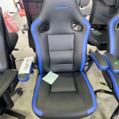 SAMPLE FURNITURE - BLACK RACER CHAIR WITH BLUE CONTRAST, FLIP UP ARMS, ADJUSTABLE, WEIGHT 120KG, RRP$148 .I