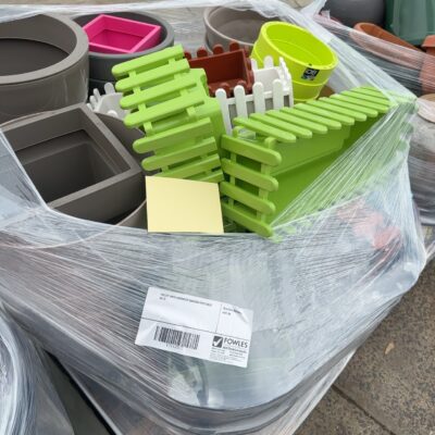 PALLET WITH ASSORTED GARDEN POTS SOLD AS IS