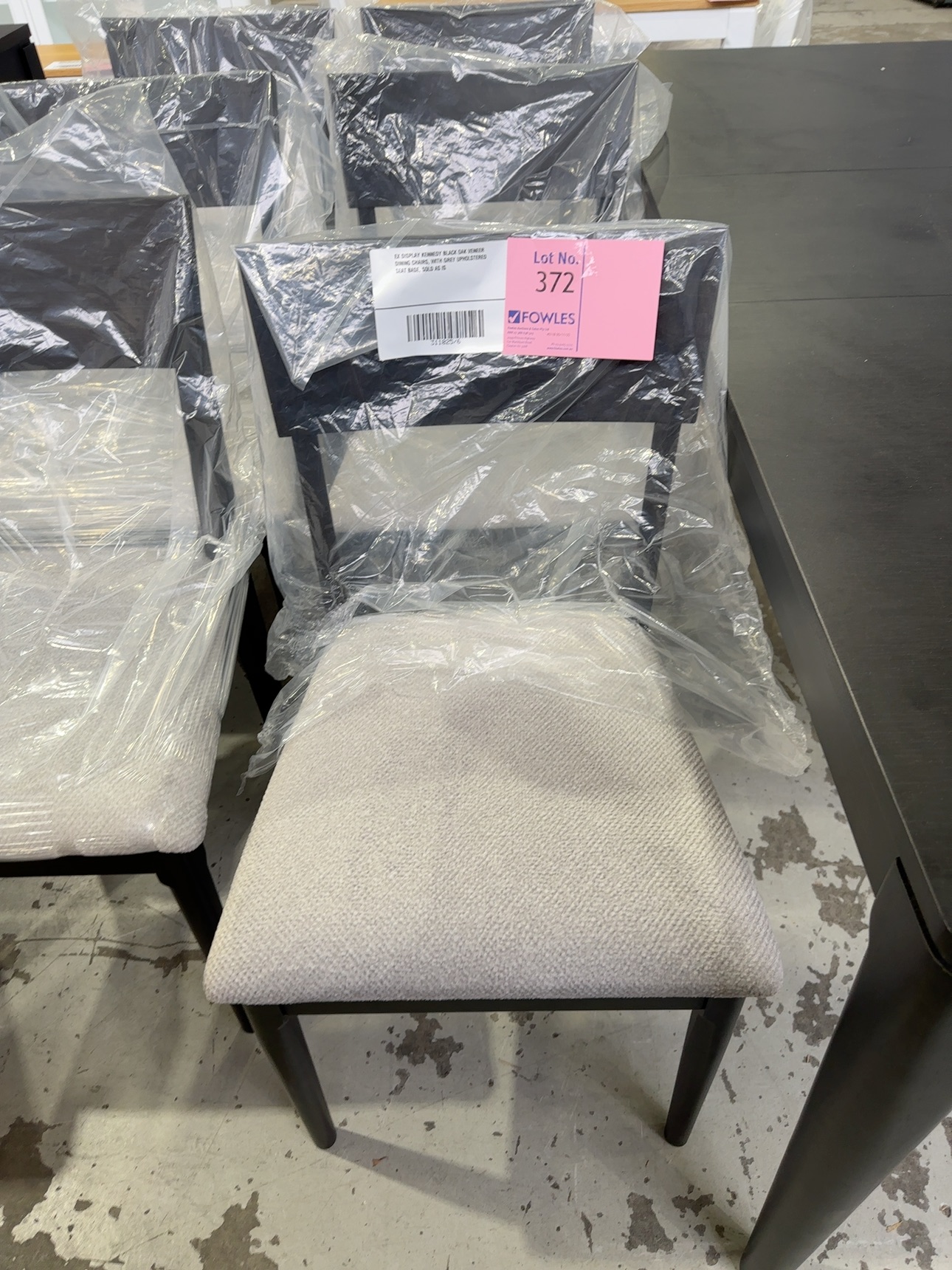 EX DISPLAY KENNEDY BLACK OAK VENEER DINING CHAIRS, WITH GREY UPHOLSTERED SEAT BASE, SOLD AS IS EX DISPLAY KENNEDY BLACK OAK VENEER DINING CHAIRS, WITH GREY UPHOLSTERED SEAT BASE, SOLD AS IS