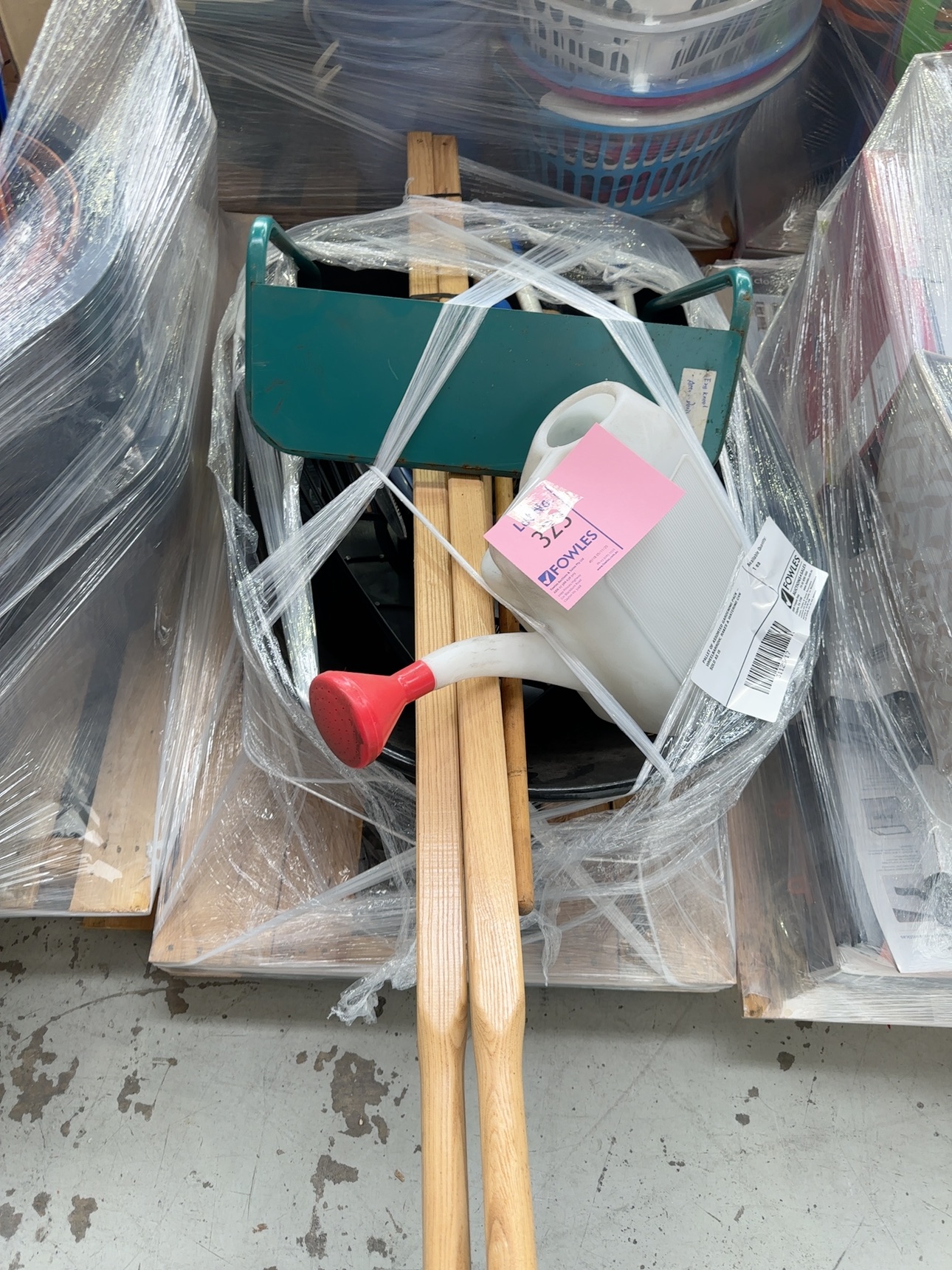 PALLET OF ASSORTED GARDENING PACK - WHEELBARROW, RAKES & WATERING CAN SOLD AS IS PALLET OF ASSORTED GARDENING PACK - WHEELBARROW, RAKES & WATERING CAN SOLD AS IS
