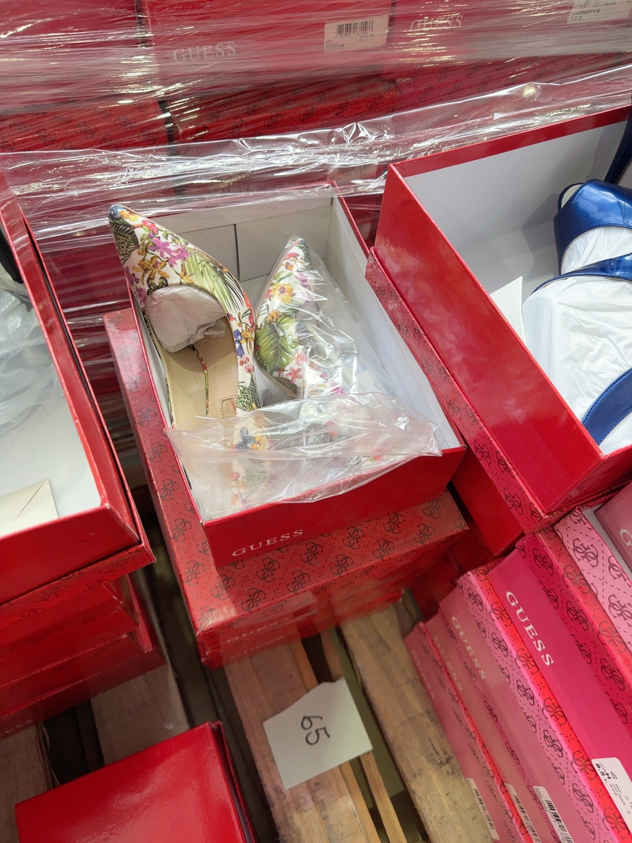 PALLET OF BULK WOMENS GUESS SHOES, ASSORTED SIZES, COLOURS AND STYLES, SOLD BY THE PALLET - QTY OF 65 PAIRS, SOLD AS IS PALLET OF BULK WOMENS GUESS SHOES, ASSORTED SIZES, COLOURS AND STYLES, SOLD BY THE PALLET - QTY OF 65 PAIRS, SOLD AS IS