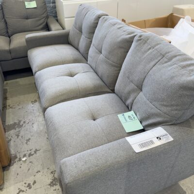 EX HIRE GREY UPHOLSTERED 3 SEATER COUCH SOLD AS IS EX HIRE GREY UPHOLSTERED 3 SEATER COUCH SOLD AS IS