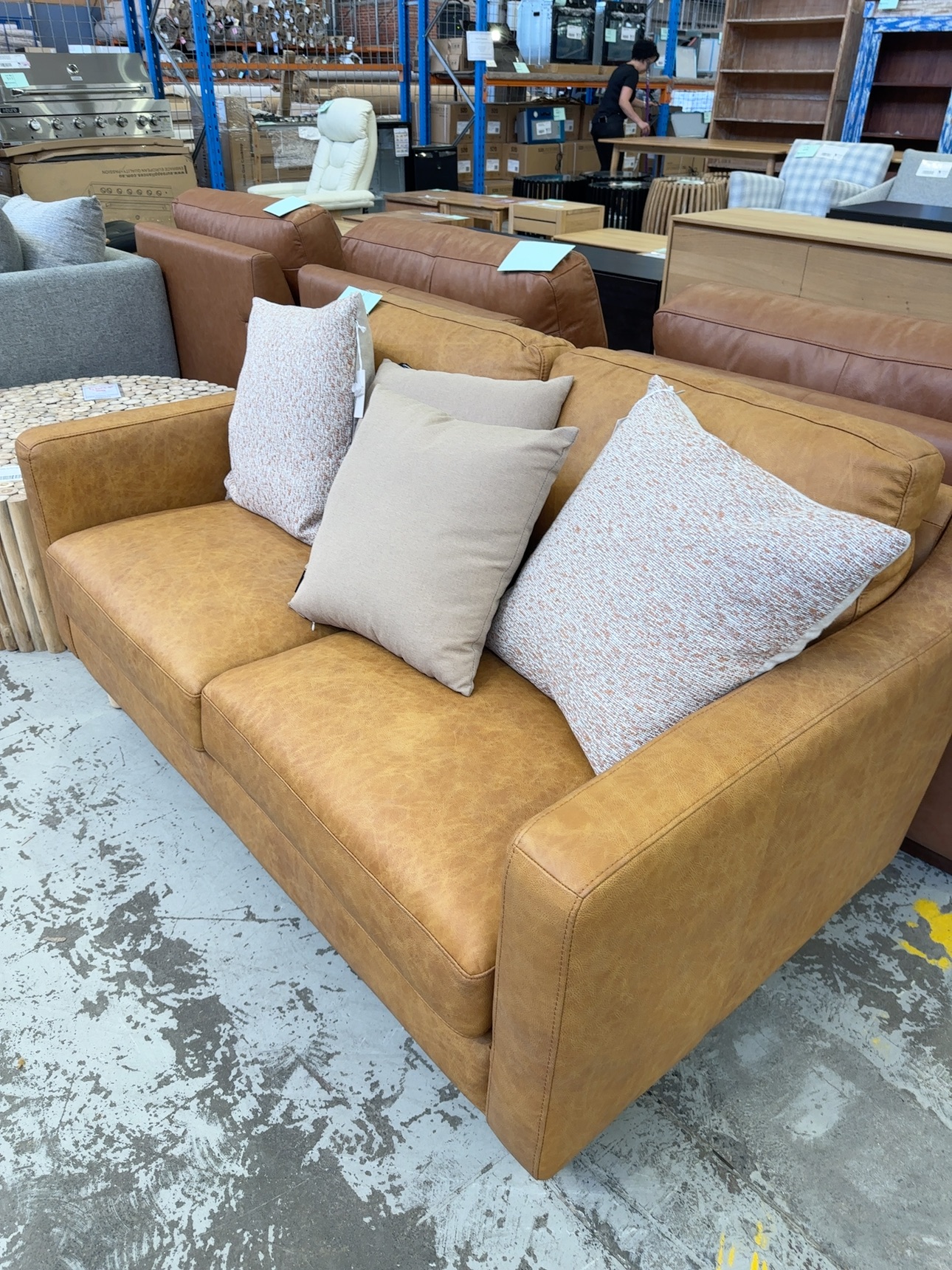 FURNITURE RETAILER CLOSURE - LUXE SOFAS 2 SEATER TAN LEATHER COUCH, WITH 4 CUSHIONS, RRP$2599 SOLD AS IS FURNITURE RETAILER CLOSURE - LUXE SOFAS 2 SEATER TAN LEATHER COUCH, WITH 4 CUSHIONS, RRP$2599 SOLD AS IS
