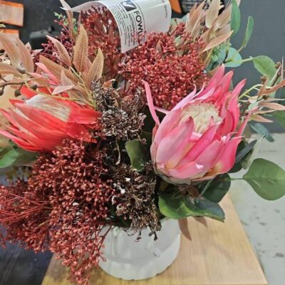 EX STAGING FAUX FLOWER ARRANGEMENT IN POT, SOLD AS IS