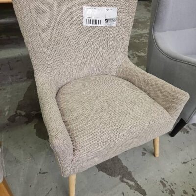 EX STAGING, BEIGE ARMCHAIR SOLD AS IS
