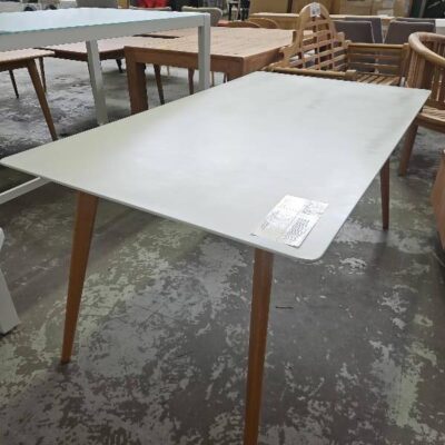 EX STAGING, WHITE LAMINATE RECTANGLE DINING TABLE WITH TIMBER LEGS SOLD AS IS EX STAGING, WHITE LAMINATE RECTANGLE DINING TABLE WITH TIMBER LEGS SOLD AS IS