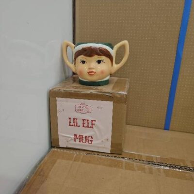 BOX OF 24 CERAMIC ELF MUGS, SOLD AS IS BOX OF 24 CERAMIC ELF MUGS, SOLD AS IS