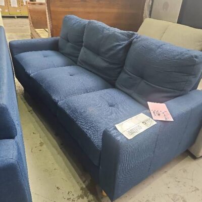 EX HIRE - NAVY MATERIAL 3 SEATER COUCH, SOLD AS IS