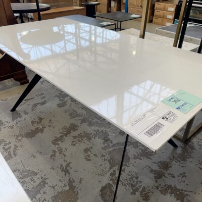EX HIRE - 1800MM WHITE GLOSS DINING TABLE WITH BLACK LEGS, SOLD AS IS