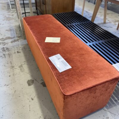 EX HIRE - RUST MATERIAL LONG OTTOMAN, SOLD AS IS