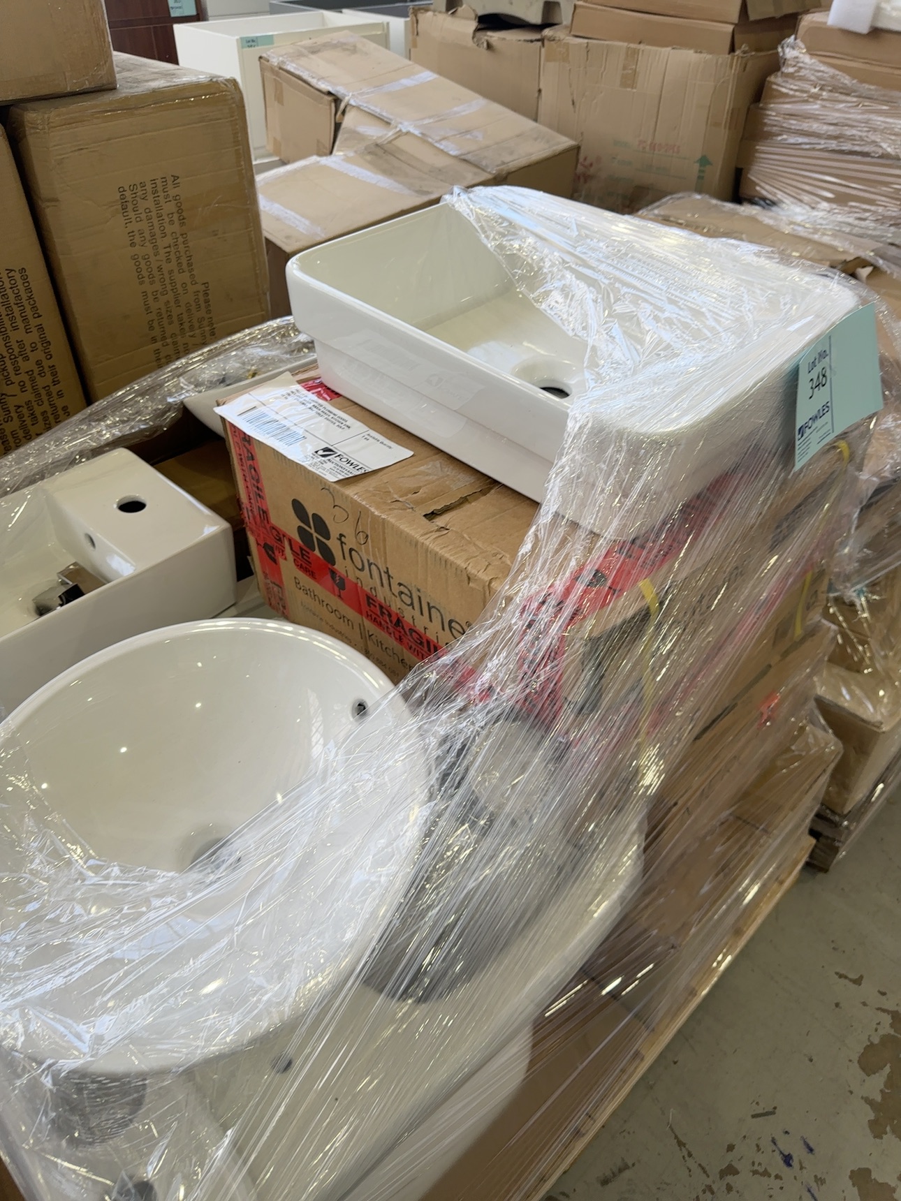 PALLET OF ASSORTED PLUMBING GOODS, INCLUDES BASIN, BASIN MIXER, KITCHEN SINK, TOILET CISTERNS, AND TOILET SIUITES, SOLD AS IS PALLET OF ASSORTED PLUMBING GOODS, INCLUDES BASIN, BASIN MIXER, KITCHEN SINK, TOILET CISTERNS, AND TOILET SIUITES, SOLD AS IS