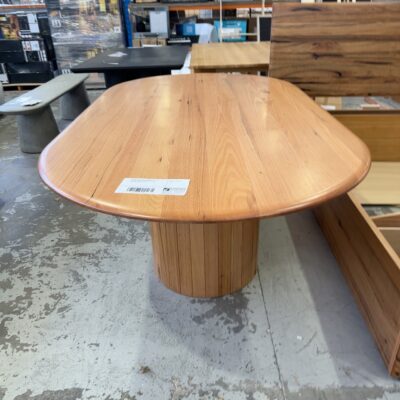 EX DISPLAY CLAIRE MESSMATE CURVED 2200MM DINING TABLE ON CENTRAL PEDESTAL, SOLD AS IS