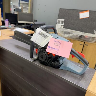 EX DISPLAY CHAINSAW, SOLD AS IS