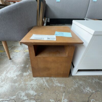 SAMPLE COMMERCIAL FURNITURE - TIMBER SIDE TABLE WITH OPEN SHELF, DAMAGED CORNER SOLD AS IS SAMPLE COMMERCIAL FURNITURE - TIMBER SIDE TABLE WITH OPEN SHELF, DAMAGED CORNER SOLD AS IS