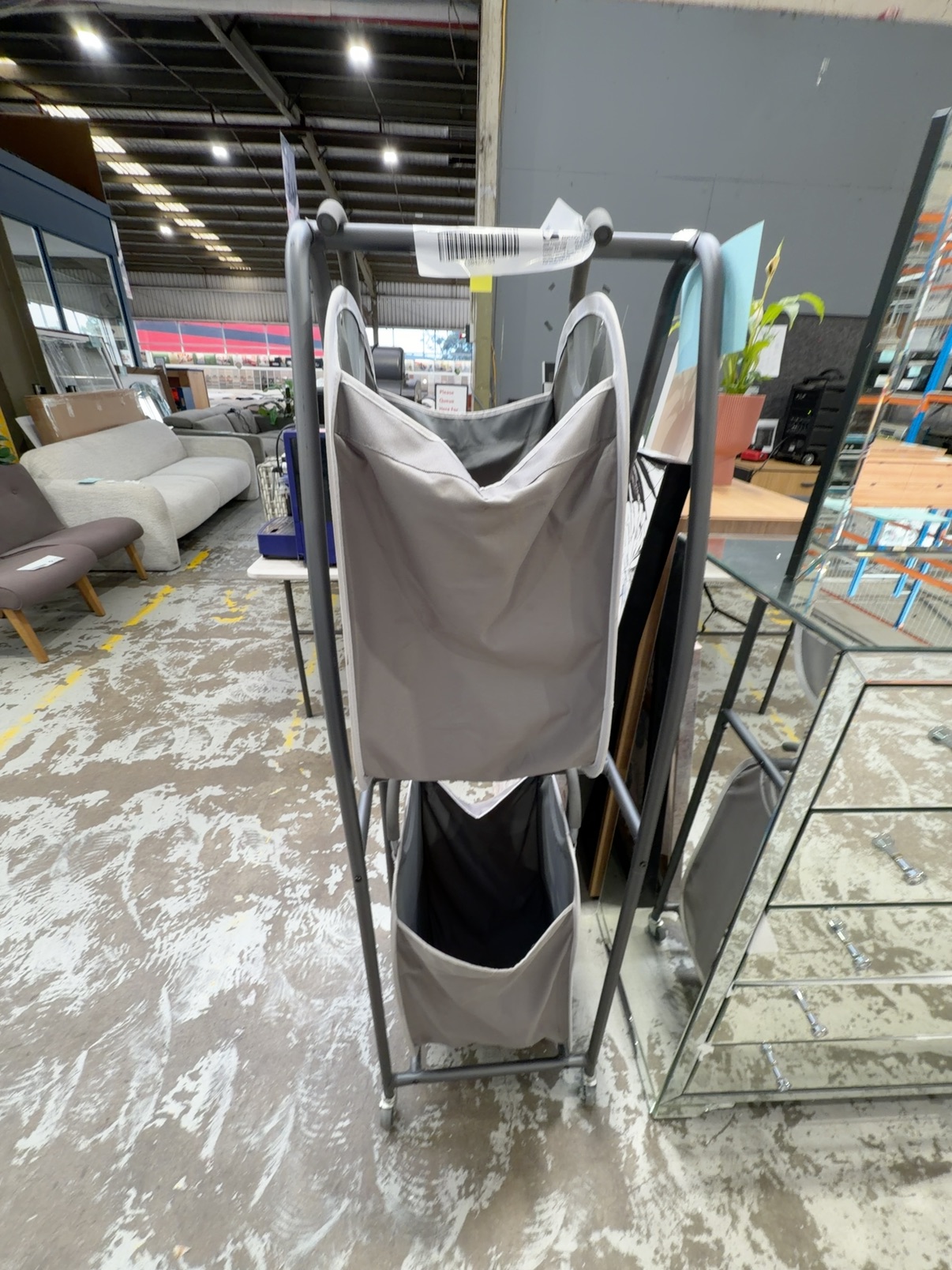 EX STAGING - GREY HANGING STORAGE, SOLD AS IS EX STAGING - GREY HANGING STORAGE, SOLD AS IS