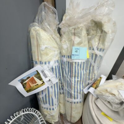 EX STAGING - NEW BAG CONTAINING STRIPED BLUE BEACH TENT, SOLD AS IS