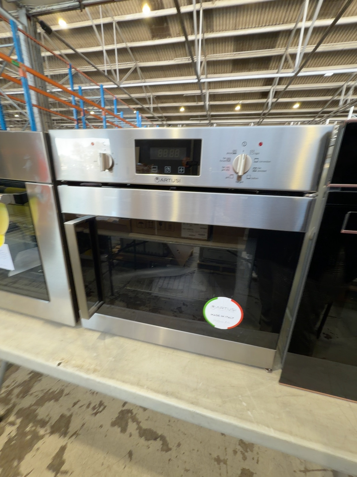 NEW ARTUSI AOS652X 600MM ELECTRIC OVEN WITH SIDE OPENING DOOR, 9 COOKING FUNCTIONS, WITH 2 YEAR WARRANTY NEW ARTUSI AOS652X 600MM ELECTRIC OVEN WITH SIDE OPENING DOOR, 9 COOKING FUNCTIONS, WITH 2 YEAR WARRANTY