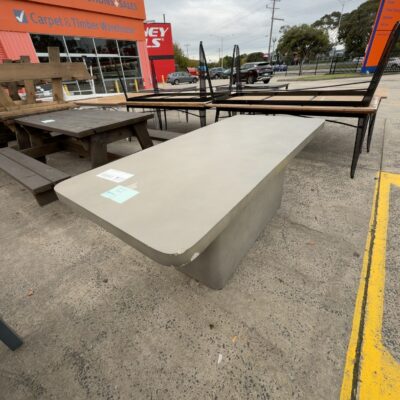 EX STAGING - GREY CONCRETE OUTDOOR TABLE, SOLD AS IS *CHIPPED* EX STAGING - GREY CONCRETE OUTDOOR TABLE, SOLD AS IS *CHIPPED*