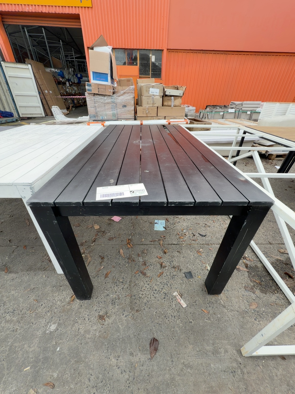 EX STAGING - BLACK SLAT OUTDOOR TABLE, SOLD AS IS EX STAGING - BLACK SLAT OUTDOOR TABLE, SOLD AS IS