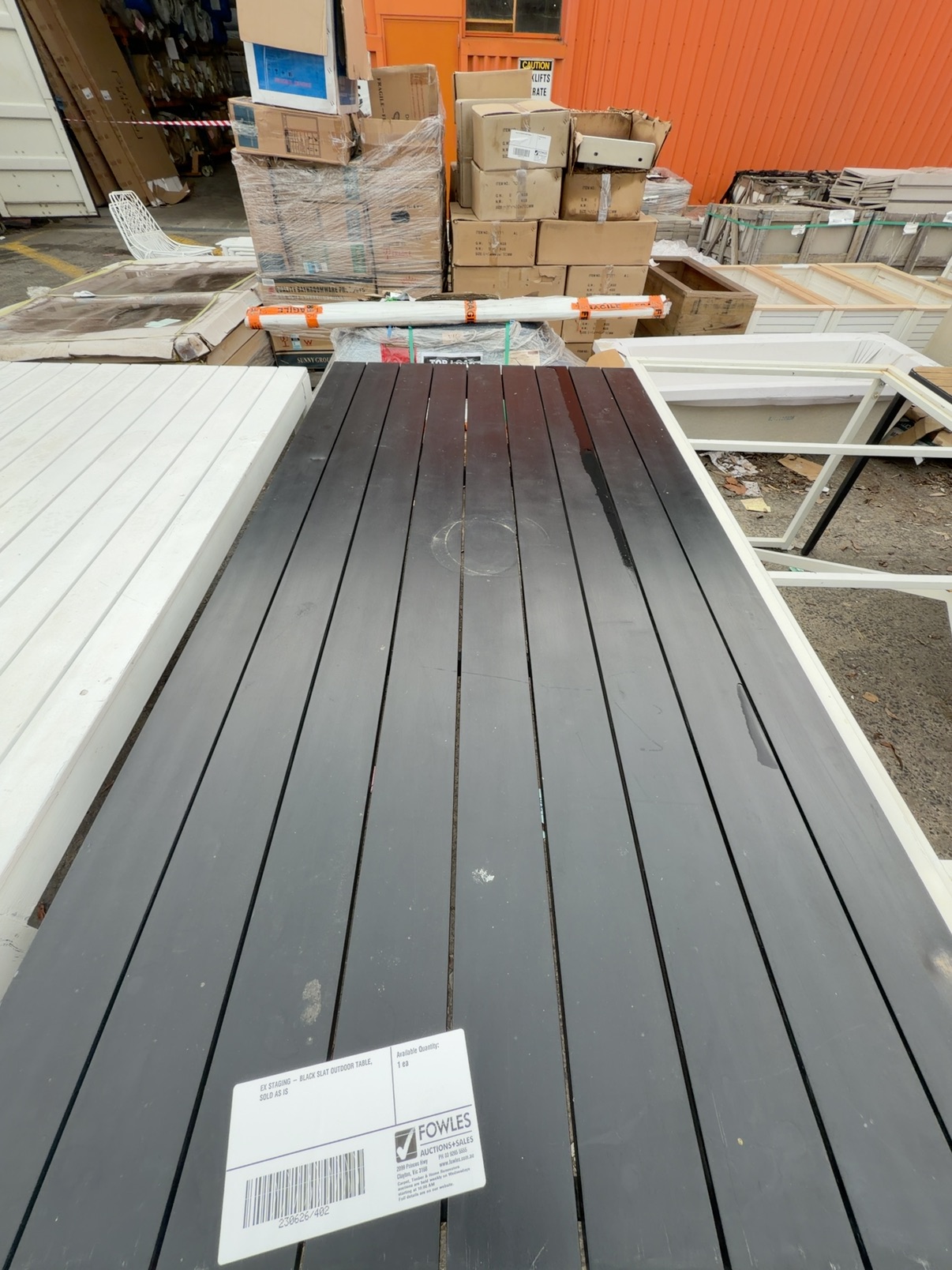 EX STAGING - BLACK SLAT OUTDOOR TABLE, SOLD AS IS EX STAGING - BLACK SLAT OUTDOOR TABLE, SOLD AS IS