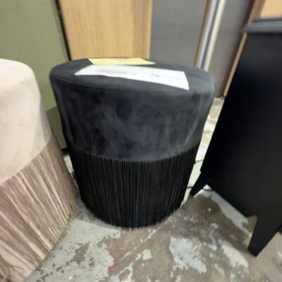 EX HIRE - BLACK VELVET ROUND OTTOMAN WITH TASSLES, SOLD AS IS