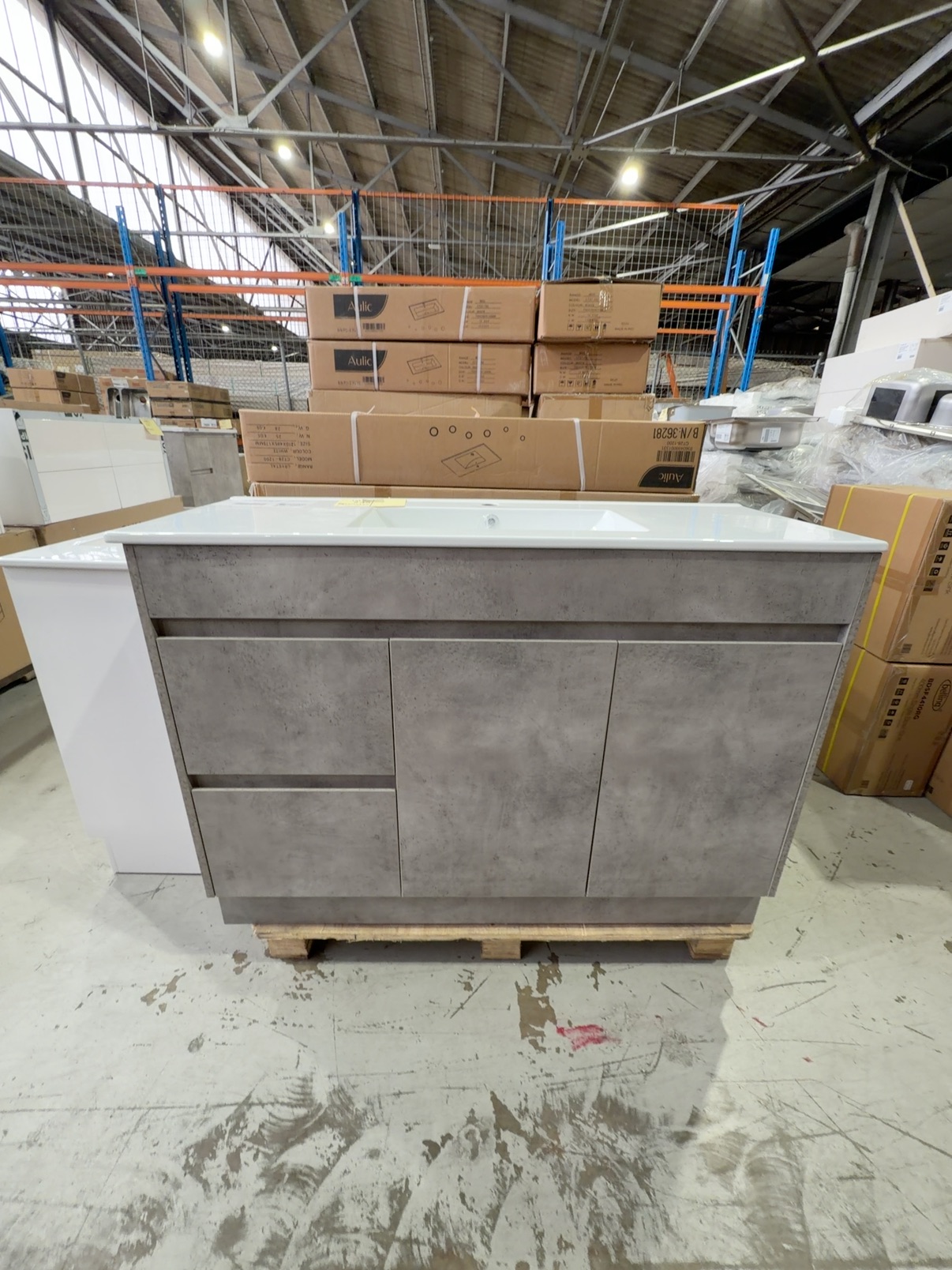 NEW LOLA CONCRETE GREY 1200MM FLOOR VANITY WITH LEFT HAND DRAWERS, WITH CERAMIC TOP RRP$1465, CA11-1200L-CT28 NEW LOLA CONCRETE GREY 1200MM FLOOR VANITY WITH LEFT HAND DRAWERS, WITH CERAMIC TOP RRP$1465, CA11-1200L-CT28