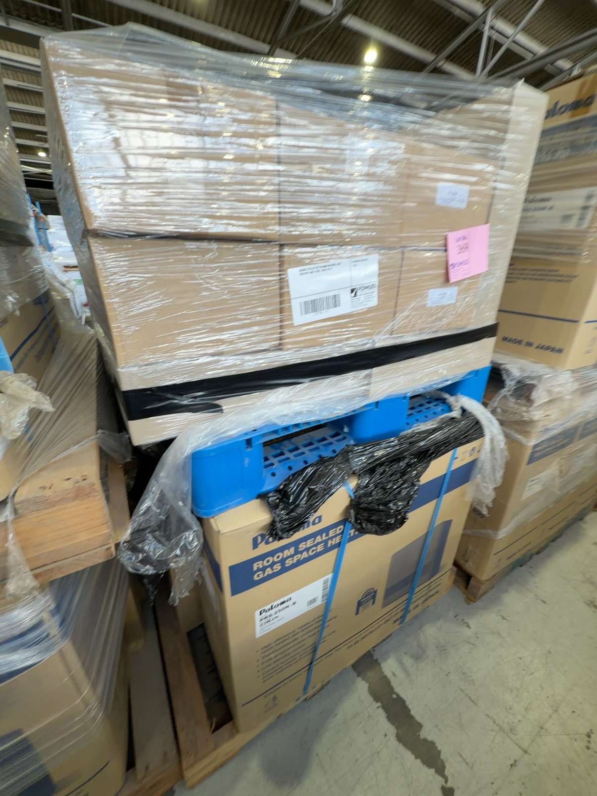 DOUBLE PALLET OF PALOMA NATURAL GAS HEATERS AND FLUES, SOLD AS IS DOUBLE PALLET OF PALOMA NATURAL GAS HEATERS AND FLUES, SOLD AS IS