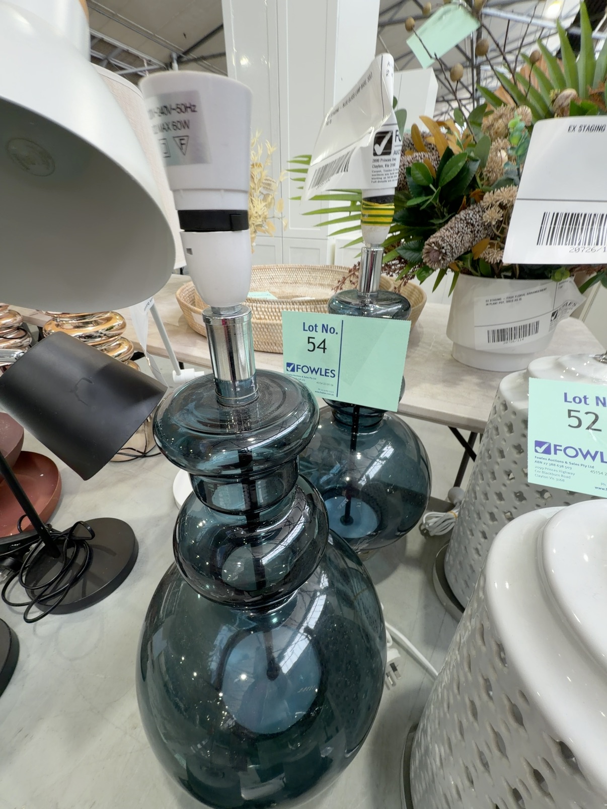 EX STAGING - BLUE GLASS LAMP BASE, SOLD AS IS EX STAGING - BLUE GLASS LAMP BASE, SOLD AS IS