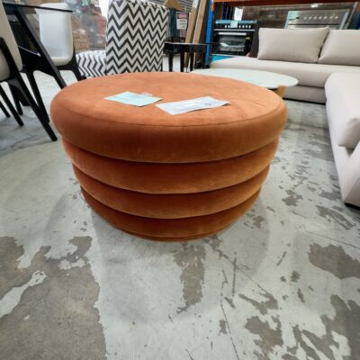 EX HIRE - RUST VELVET ROUND OTTOMAN, SOLD AS IS EX HIRE - RUST VELVET ROUND OTTOMAN, SOLD AS IS