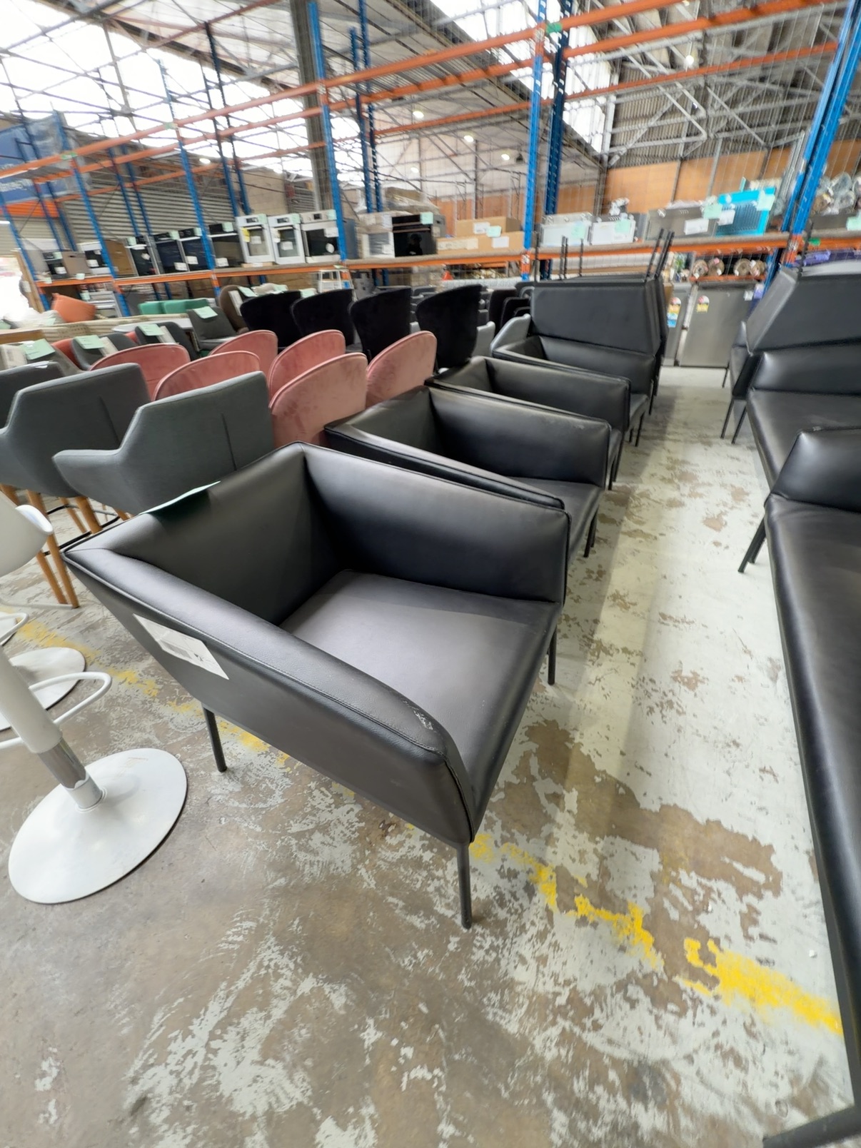 EX HIRE - BLACK PU ARM CHAIR, SOLD AS IS EX HIRE - BLACK PU ARM CHAIR, SOLD AS IS