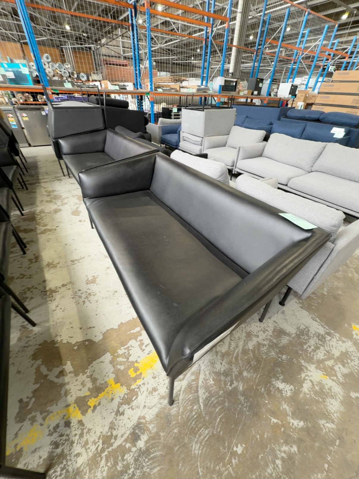 EX HIRE - BLACK PU COUCH, SOLD AS IS EX HIRE - BLACK PU COUCH, SOLD AS IS
