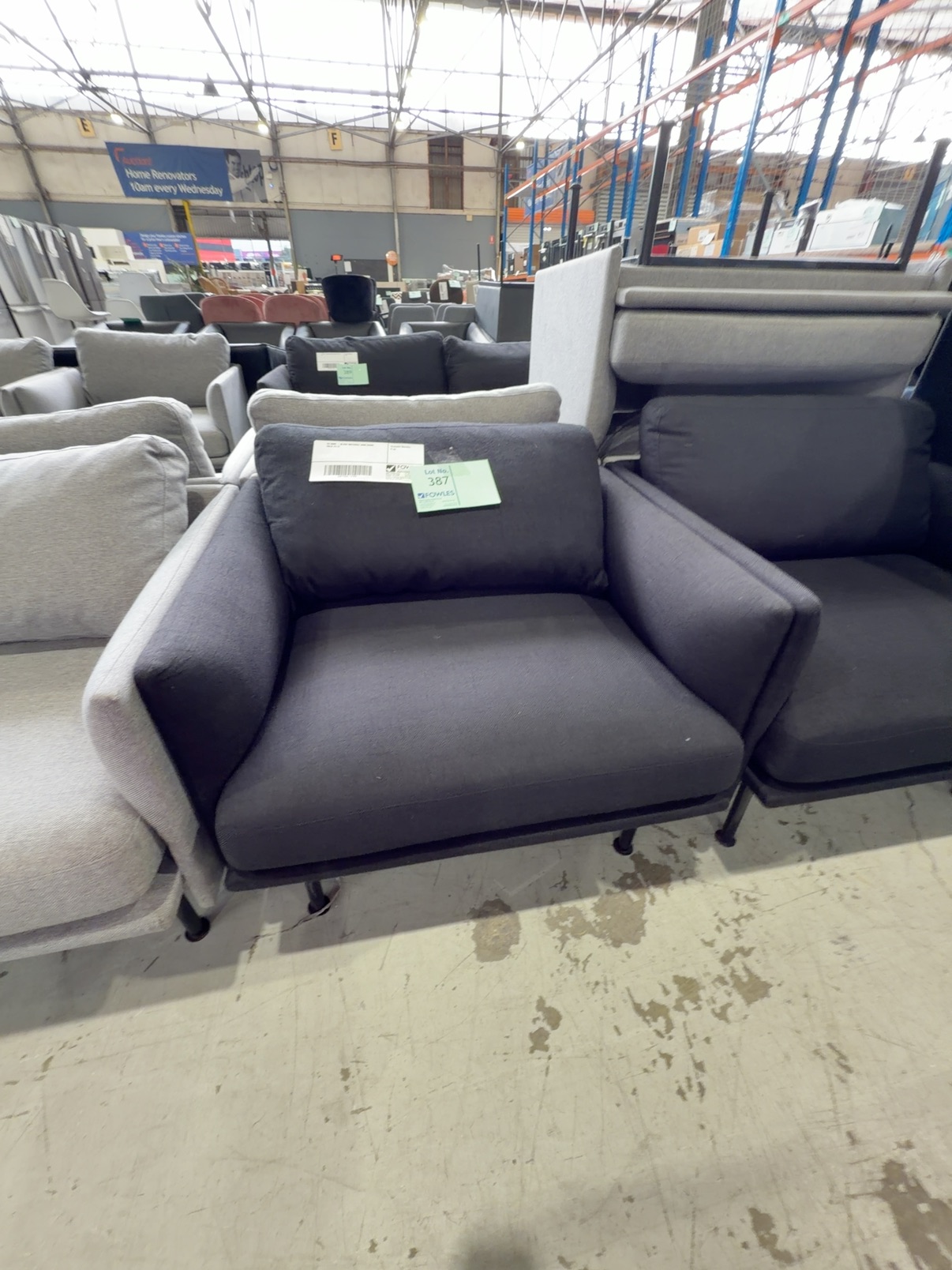 EX HIRE - BLACK MATERIAL ARM CHAIR, SOLD AS IS EX HIRE - BLACK MATERIAL ARM CHAIR, SOLD AS IS