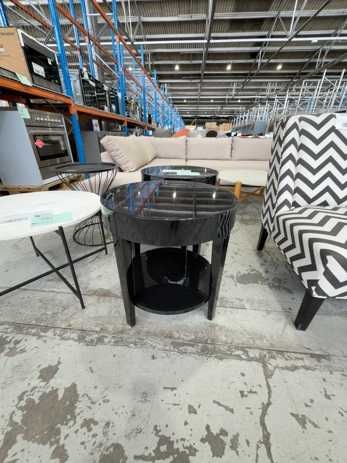 EX DISPLAY HOME -BLACK GLOSS ACRYLIC ROUND SIDE TABLE, SOME LIGHT MARKS, SOLD AS IS EX DISPLAY HOME -BLACK GLOSS ACRYLIC ROUND SIDE TABLE, SOME LIGHT MARKS, SOLD AS IS