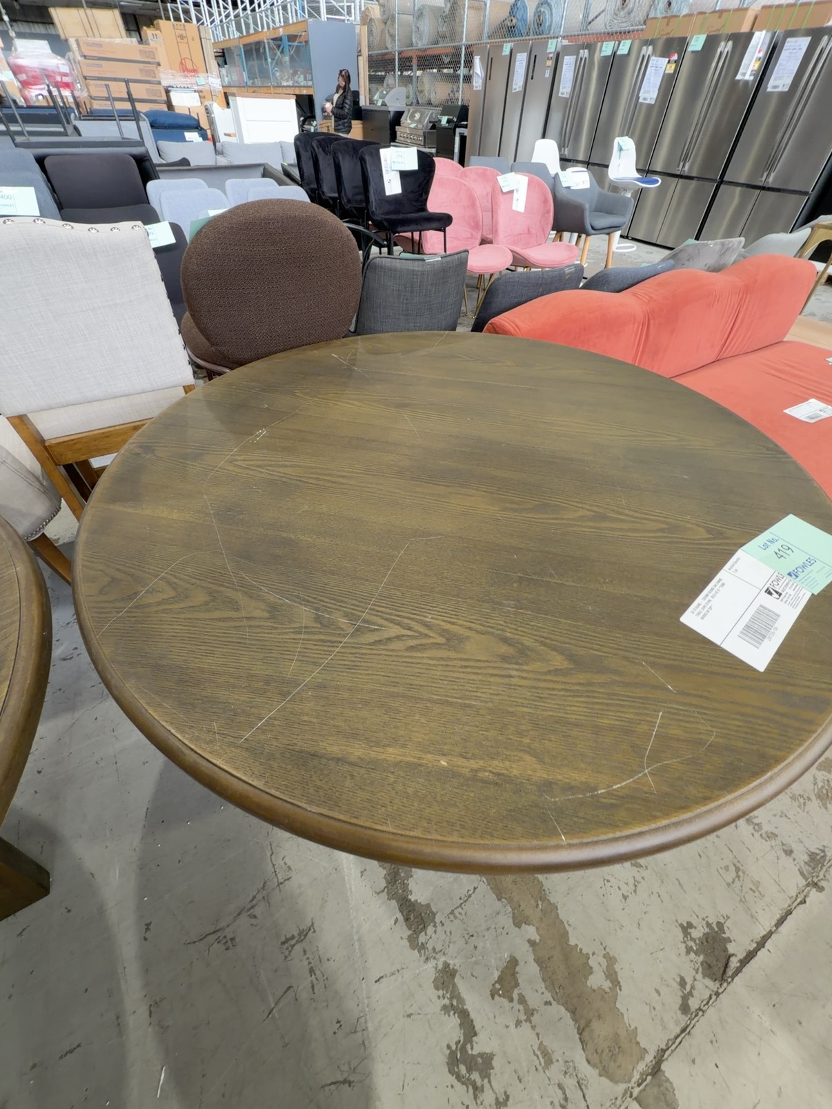 EX STAGING - 1300MM ROUND OAK DINING TABLE, DARK STAIN, SOLD AS IS **SOME MARKS IN TOP** EX STAGING - 1300MM ROUND OAK DINING TABLE, DARK STAIN, SOLD AS IS **SOME MARKS IN TOP**