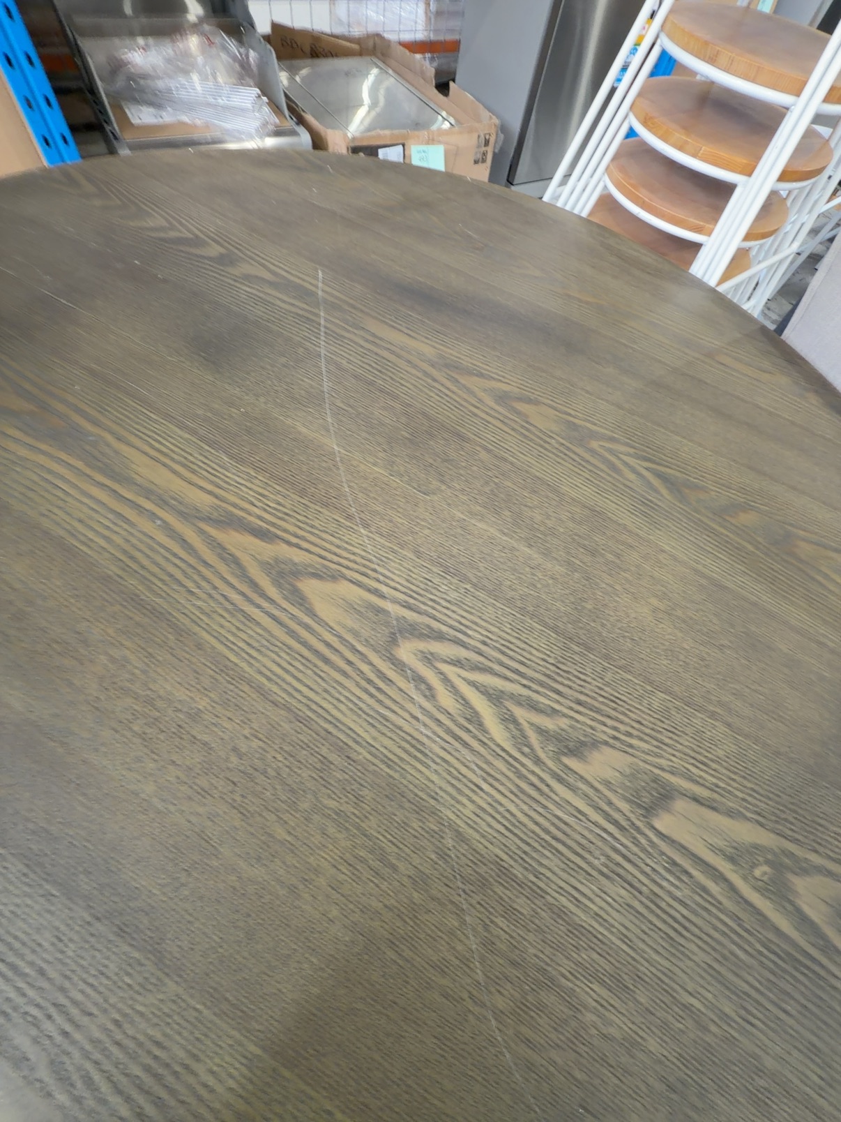 EX STAGING - 1300MM ROUND OAK DINING TABLE, DARK STAIN, SOLD AS IS **SOME MARKS IN TOP** EX STAGING - 1300MM ROUND OAK DINING TABLE, DARK STAIN, SOLD AS IS **SOME MARKS IN TOP**
