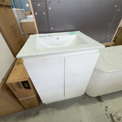 600MM GLOSS WHITE FLOOR VANITY WITH CERAMIC TOP - MISSING SHELF, FLOOR BASE MISALIGNED, SOLD AS IS 600MM GLOSS WHITE FLOOR VANITY WITH CERAMIC TOP - MISSING SHELF, FLOOR BASE MISALIGNED, SOLD AS IS