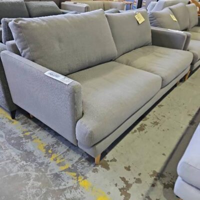 EX STAGING LIGHT GREY FABRIC COUCH, 3 SEATER SOLD AS IS