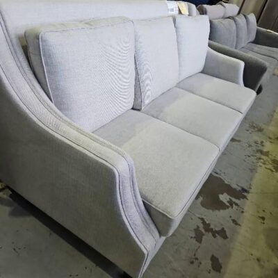 EX STAGING - LIGHT GREY 3 SEATER COUCH, SOLD AS IS EX STAGING - LIGHT GREY 3 SEATER COUCH, SOLD AS IS