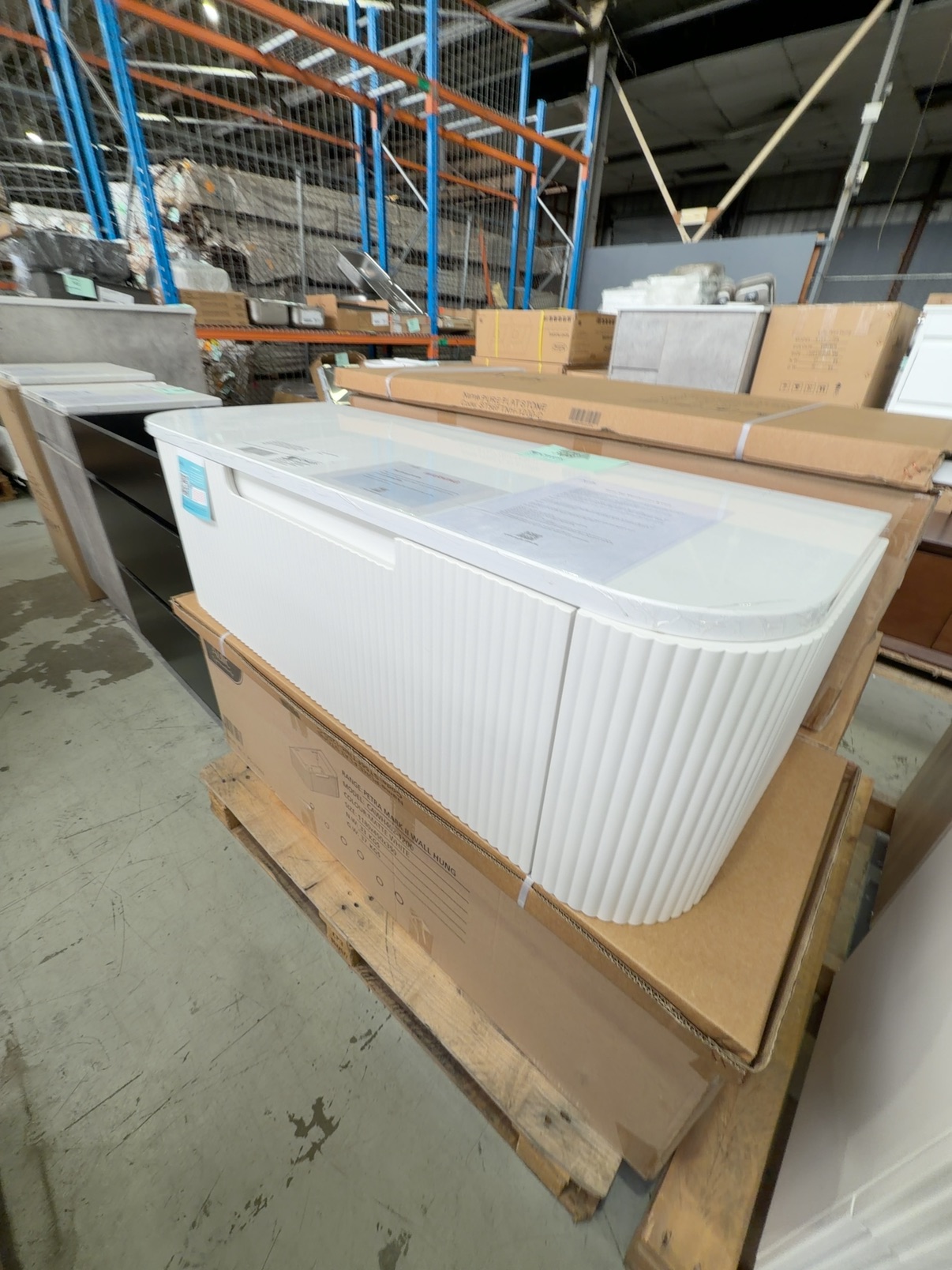 NEW 1200MM AULIC PETRA MARK II WALL HUNG CURVED V GROOVE MATTE WHITE VANITY WITH PURE SOLID SURFACE CURVED STONE TOP RRP$2295 CAWH402-1200-ST56FT NEW 1200MM AULIC PETRA MARK II WALL HUNG CURVED V GROOVE MATTE WHITE VANITY WITH PURE SOLID SURFACE CURVED STONE TOP RRP$2295 CAWH402-1200-ST56FT