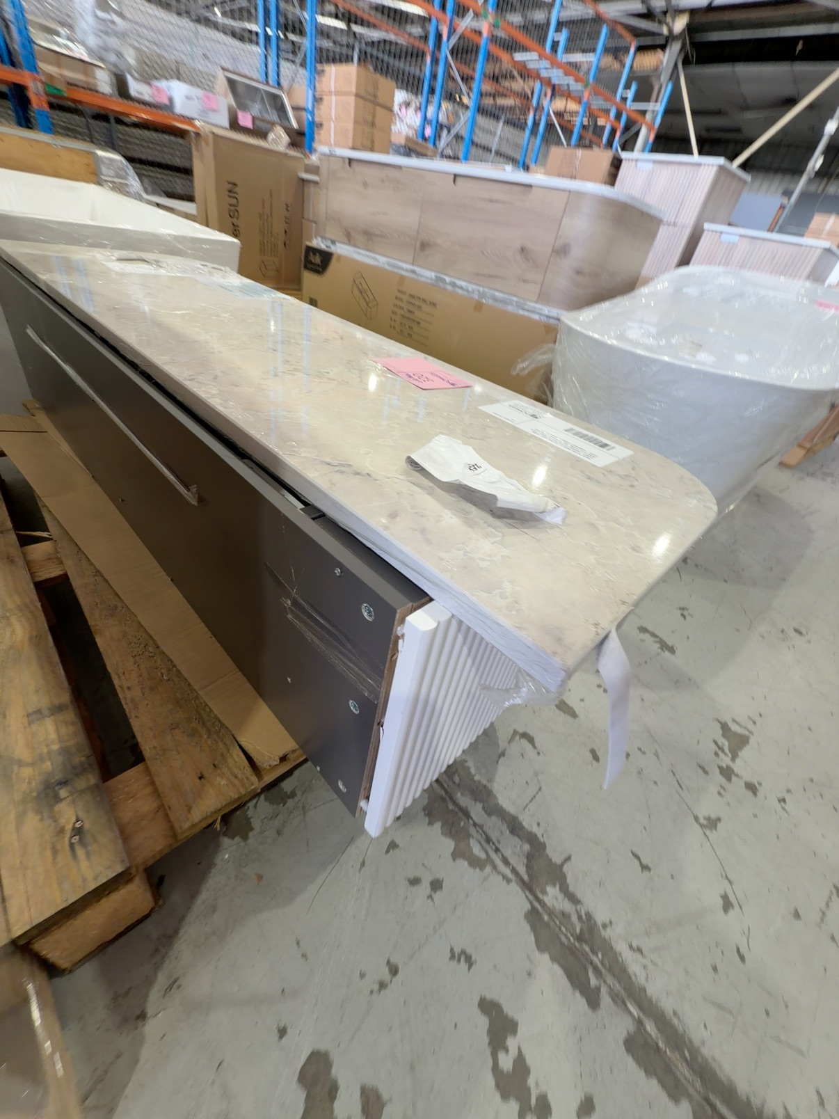 AULIC PETRA MARK II 1500MM WALL HUNG VANITY, CURVED FLUTED MATTE WHITE, WITH PURE FLAT STONE TOP, CAWH402-1500 RRP$2835 **DAMAGED CABINET, SOLD AS IS** AULIC PETRA MARK II 1500MM WALL HUNG VANITY, CURVED FLUTED MATTE WHITE, WITH PURE FLAT STONE TOP, CAWH402-1500 RRP$2835 **DAMAGED CABINET, SOLD AS IS**
