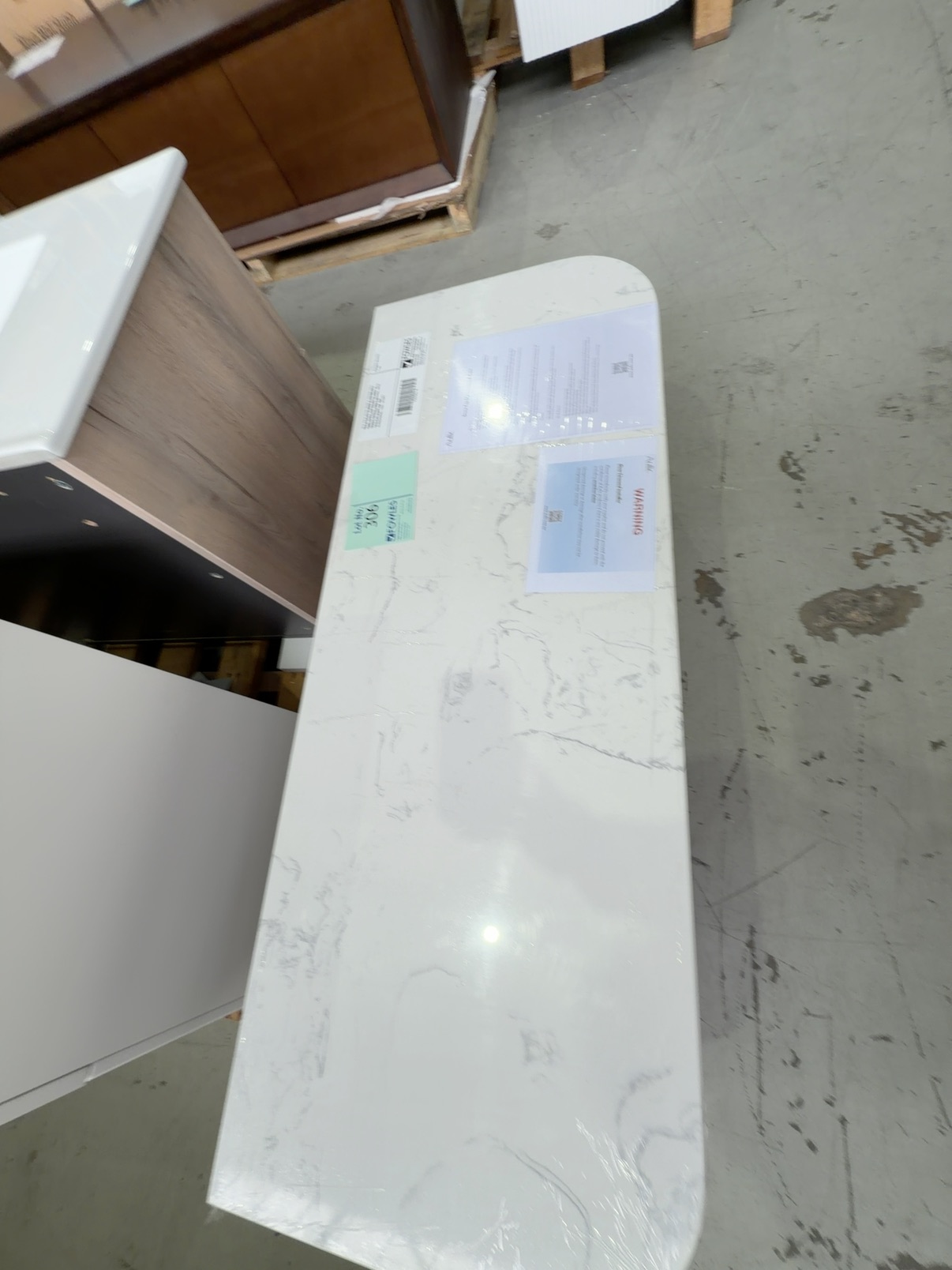 NEW AULIC PETRA MARK II 1200MM WALL HUNG VANITY, CURVED MATTE WHITE V GROOVE PROFILE, SINGLE DRAWER, WITH CATO FLAT STONE TOP RRP$2409 CAWH46-1200-ST26FT NEW AULIC PETRA MARK II 1200MM WALL HUNG VANITY, CURVED MATTE WHITE V GROOVE PROFILE, SINGLE DRAWER, WITH CATO FLAT STONE TOP RRP$2409 CAWH46-1200-ST26FT