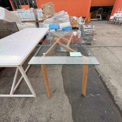 EX STAGING - GLASS DINING TABLE WITH TIMER LOOK METAL FRAME, SOLD AS IS EX STAGING - GLASS DINING TABLE WITH TIMER LOOK METAL FRAME, SOLD AS IS
