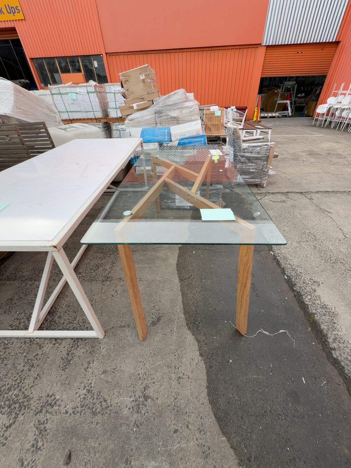 EX STAGING - GLASS DINING TABLE WITH TIMER LOOK METAL FRAME, SOLD AS IS EX STAGING - GLASS DINING TABLE WITH TIMER LOOK METAL FRAME, SOLD AS IS