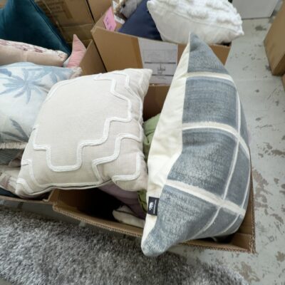 BOX OF ASSORTED EX STAGING CUSHIONS, SOLD AS IS BOX OF ASSORTED EX STAGING CUSHIONS, SOLD AS IS
