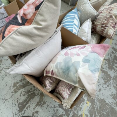 BOX OF ASSORTED EX STAGING CUSHIONS, SOLD AS IS BOX OF ASSORTED EX STAGING CUSHIONS, SOLD AS IS