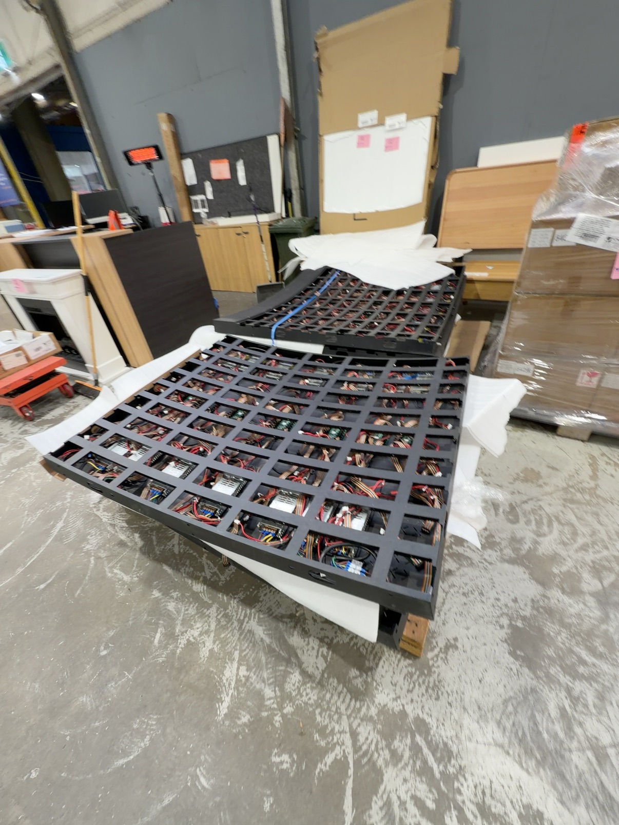 INSURANCE SALVAGE - GIANT COMMERCIAL LED VIDEO WALL PACKAGE APPROX. 6.0M X 2.52M (15.12SQM). INCLUDES MODULAR LED PANELS, 8-SECTION METAL FRAME, INTERNAL WIRING, POWER SUPPLIES & CABLING. REPORTED REPLACEMENT VALUE APPROX. $150,000-$200,000. THREE FRAME SECTIONS REPORTED DAMAGED; LED MODULE DAMAGE NOT VERIFIED. ORIGINAL CONTROLLER NOT SUPPLIED. UNTESTED / UNCOMMISSIONED - SOLD AS IS - INSPECTION STRONGLY RECOMMENDED. INSURANCE SALVAGE - GIANT COMMERCIAL LED VIDEO WALL PACKAGE APPROX. 6.0M X 2.52M (15.12SQM). INCLUDES MODULAR LED PANELS, 8-SECTION METAL FRAME, INTERNAL WIRING, POWER SUPPLIES & CABLING. REPORTED REPLACEMENT VALUE APPROX. $150,000-$200,000. THREE FRAME SECTIONS REPORTED DAMAGED; LED MODULE DAMAGE NOT VERIFIED. ORIGINAL CONTROLLER NOT SUPPLIED. UNTESTED / UNCOMMISSIONED - SOLD AS IS - INSPECTION STRONGLY RECOMMENDED.