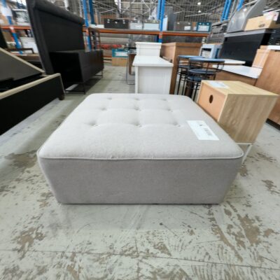 EX SHOWROOM, LARGE GREY FABRIC OTTOMAN, SOLD AS IS