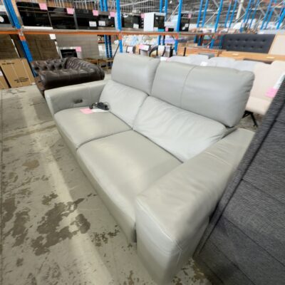 SECOND HAND - GREY LEATHER 2.5 SEATER COUCH, ELECTRIC RECLINER & HEADRESTSOLD AS IS SECOND HAND - GREY LEATHER 2.5 SEATER COUCH, ELECTRIC RECLINER & HEADRESTSOLD AS IS